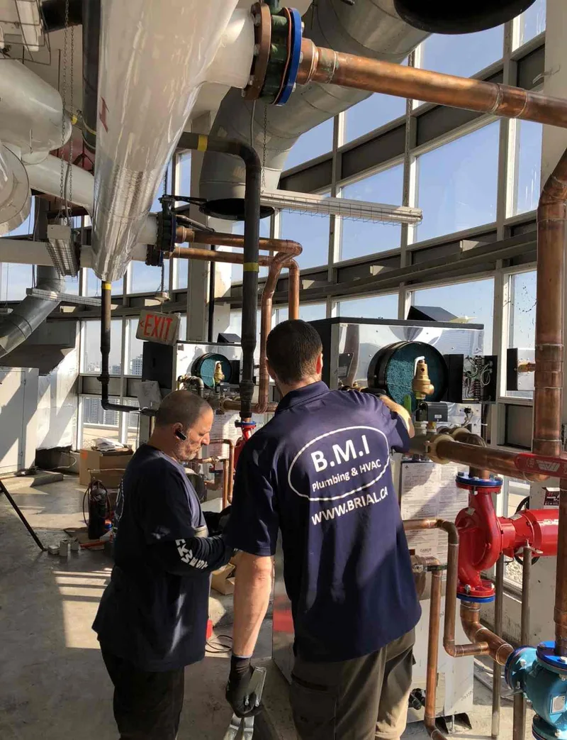 BMI crew installing new copper risers in a Toronto condominium mechanical penthouse