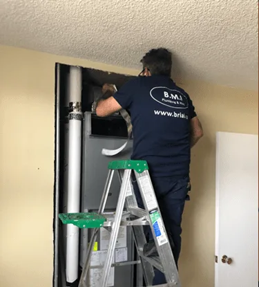 New riser pipe being insulated inside a condominium riser shaft